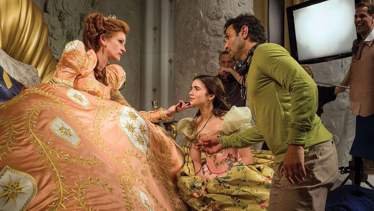 From left: Julia Roberts, Lily Collins and director Tarsem Singh on the set of Mirror, Mirror, which opened nine weeks before Snow White and the Huntsman in 2012.