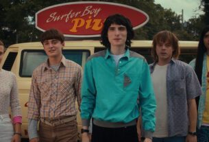 (L to R) Millie Bobby Brown as Eleven, Noah Schnapp as Will Byers, Finn Wolfhard as Mike Wheeler, Charlie Heaton as Jonathan Byers, and Eduardo Franco as Argyle in STRANGER THINGS.