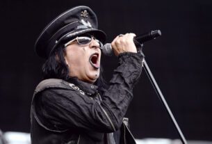 Singer Taime Downe of Faster Pussycat performs onstage at Irvine Meadows Amphitheatre on August 15, 2015 in Irvine, California.