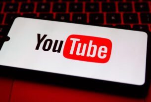 YouTube logo is displayed on a mobile phone screen for illustration photo.