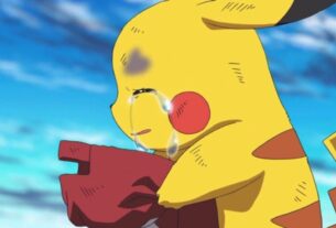 Pikachu crying while holding a hat