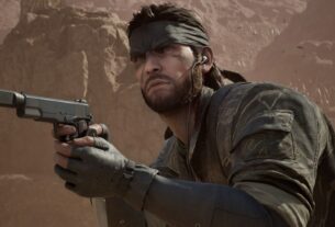 Snake looks up while holding a silenced pistol.