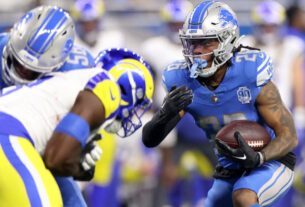 Jahmyr Gibbs of the Detroit Lions runs the ball for a touchdown during the NFC Wild Card Playoffs on January 14, 2024 in Detroit.