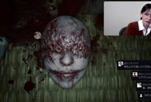 Konatsu Kato makes a face of disgust while looking at a bloody mask in Silent Hill f.