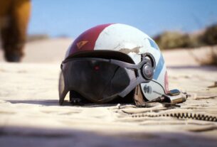 An Arc Raider helmet sits abandoned on the ground.