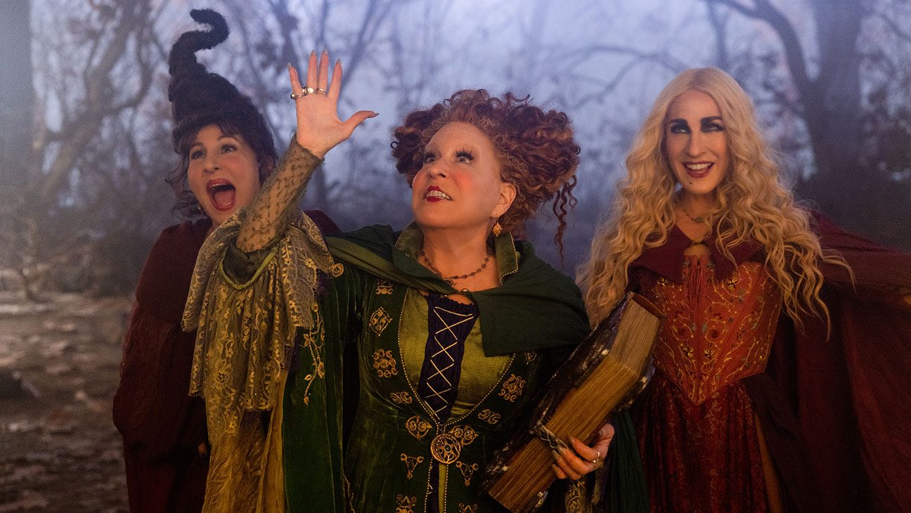 Kathy Najimy as Mary Sanderson, Bette Midler as Winifred Sanderson, and Sarah Jessica Parker as Sarah Sanderson in Disney's live-action HOCUS POCUS 2.