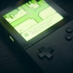 Portátil retrô rodando um jogo emulado, usado para ilustrar status de compatibilidade dos emuladores